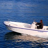 Mootorpaat Poseidon Fish 4.99 M vee äravooluga